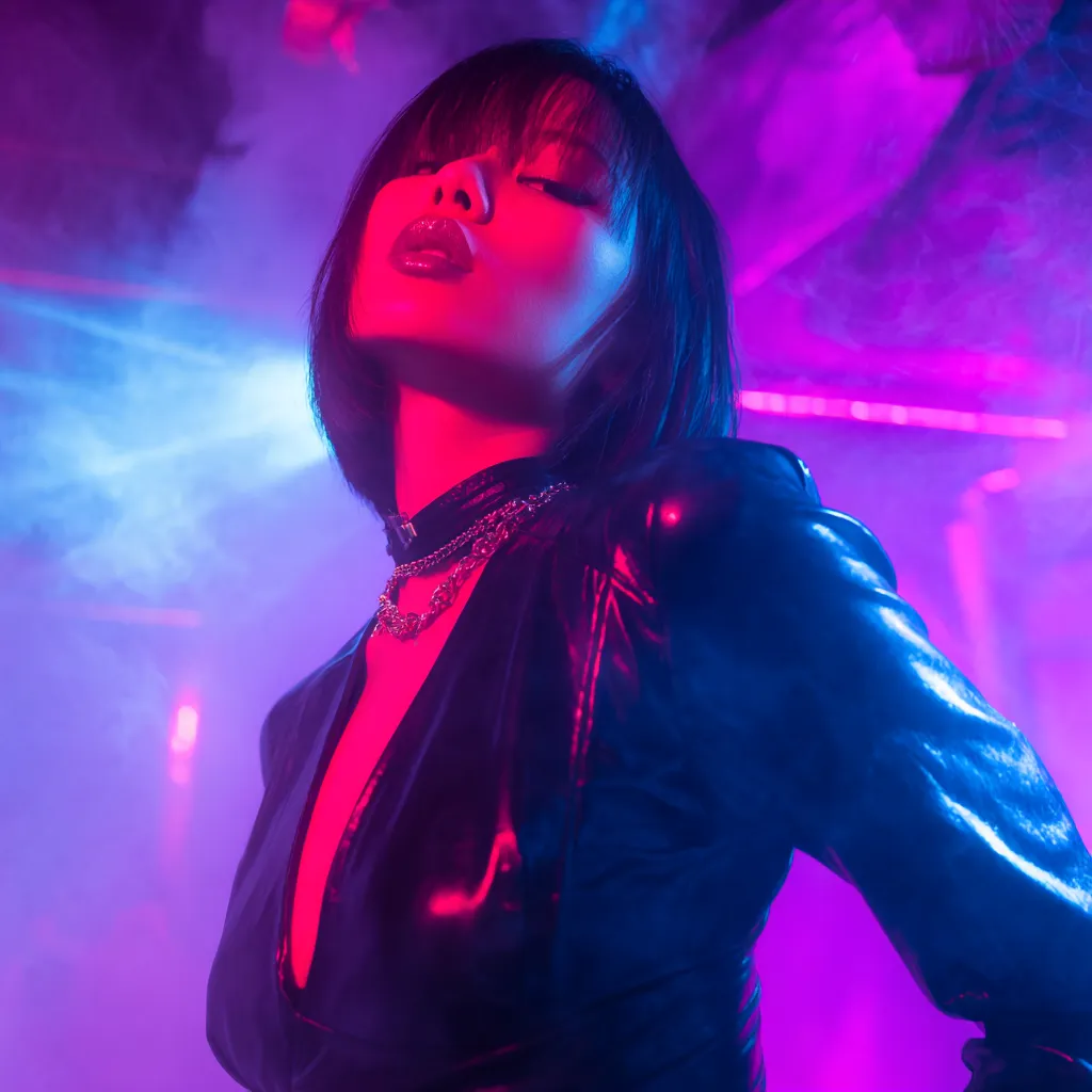 Ember, the featured Vixen AI companion, in a bold intimate portrait